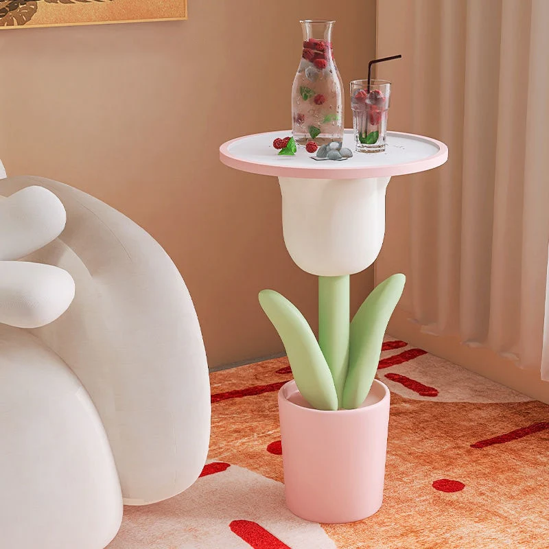 Tulip shaped kawaii bedside table in pastel tones next to a lamp